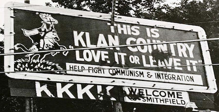 1950s billboard: United Klans of America, Inc. - Keep Fighitng Communism & Integration