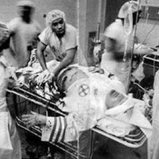 black-physicians-treating-in-the-ER-a-member-of-KKK0d8e39cf9fa8b240