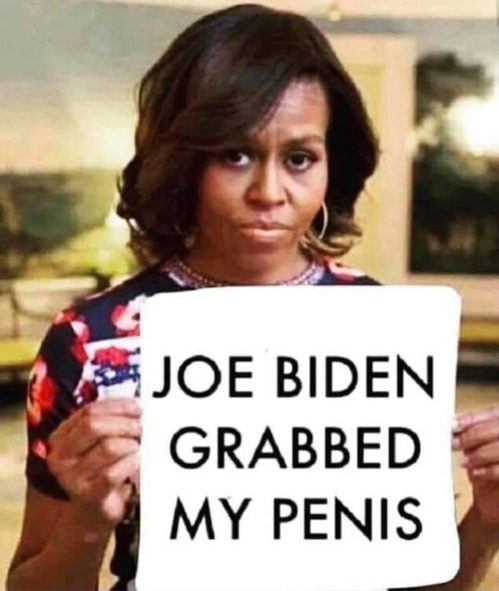 michelle-obama-holding-sign-e16118999385045fe7bc5a98e04767.jpeg